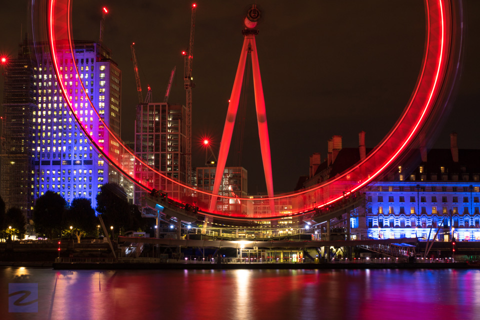  London Eye on the Thames River at Night